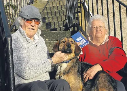  ?? Picture above: Dougie Nicolson. ?? Buglarian dogs in new homes. Clockwise from above: Dave Chalmers with his new dog Lisl and Anne Marie Grant, who brought the dogs back from Bulgaria; Eddie at the Leven home of the Hepburn family and Goshko with Graham Duthie, Nicola Duthie and her son...