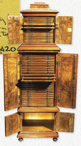  ?? (Image courtesy Heritage Auctions.) ?? Below: Coin cabinets, such as this English example from the early 1800s, were used by wealthier collectors to store and exhibit their coins.