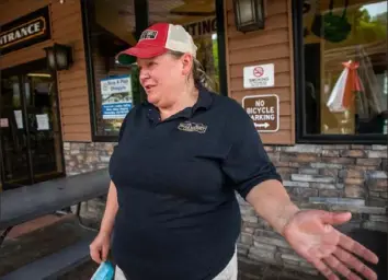  ??  ?? Pam Kruse, owner of Falls Market and member of the Ohiopyle council, talks about how the Ohiopyle Multimodal Gateway Project constructi­on has affected her business on Thursday in Ohiopyle.