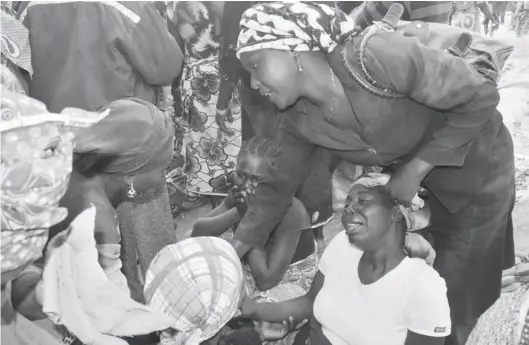  ?? PHOTO: NAN ?? People crying over their loved ones killed during the Shonong crisis in Riyom Local Government Area of Plateau on Tuesday.