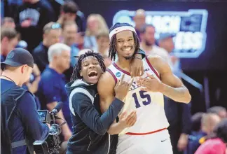  ?? ISAAC HALE/ASSOCIATED PRESS ?? Dayton forward DaRon Holmes II (15) celebrates his team’s victory over Nevada on Thursday in the first round the NCAA Tournament in Salt Lake City.