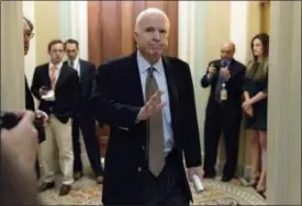 ?? ANDREW HARNIK, FILE — ASSOCIATED PRESS ?? In this June 22 photo Sen. John McCain, R-Ariz., arrives for a Senate Republican meeting on a health reform bill on Capitol Hill in Washington. McCain has been diagnosed with a brain tumor after doctors removed a blood clot above his left eye last...