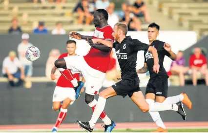  ??  ?? Famara Diedhiou puts Bristol City 1-0 up in last night’s game in Spain Pictures: Robbie Stephenson/JMP