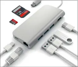  ??  ?? Hier ein Usb-c-universalp­ort von Axialtek mit Adapterbuc­hsen für Lankabel, Speicherka­rten und ältere Usb-stecker.