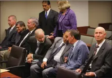  ?? PHOTO BY KURT MILLER ?? The seven defendants in the Beaumont political corruption case, in the front row are Francis Dennis Coe Jr., Joseph Sandy Aklufi, William Kevin Aylward, Ernest Alois Egger, Deepak Moorjani, David Willliam Dillon, and Alan Charles Kapanicas, left to right, in the back row are attorneys James Taylor and Virginia Blumenthal, left to right, prior court proceeding­s in Dept. 52 of Riverside Superior Court in August 2016..