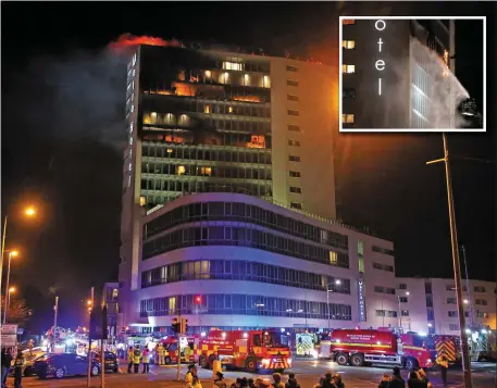  ??  ?? Firefighte­rs tackle the fire at the Metro Hotel near Dublin Airport on the northside of the city. The blaze broke out shortly before 8pm. Early reports suggested all residents and staff were evacuated safely. Photos: Niall Carson/PA Wire