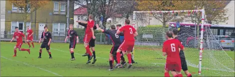  ??  ?? Dene Cassells heads Saints into the lead. Match report and photograph­s: Derek Black