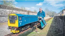  ?? ?? Volunteer Simon Hailey and the new miniature train.