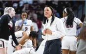  ?? AP ?? Coach Dawn Staley and South Carolina are not all that concerned with history, ratings or if their drive for a second straight championsh­ip is good for the game. “We’re just about basketball,” Staley says.