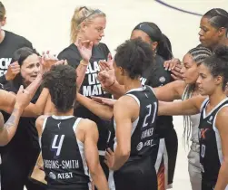  ??  ?? Mercury coach Sandry Brondello, left, talks with her team prior to a game in Phoenix on Sunday.