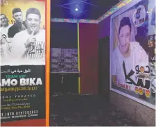  ??  ?? Hamo Bika’s recording studio in Alexandria is adorned with posters of his past shows, but he is not permitted to perform in his home country.