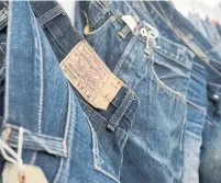  ?? JEFF CHIU THE ASSOCIATED PRESS FILE PHOTO ?? Levi Strauss filed a plan for an IPO that would raise as much as $587 million (U.S.), with the firm selling 36.7 million shares.