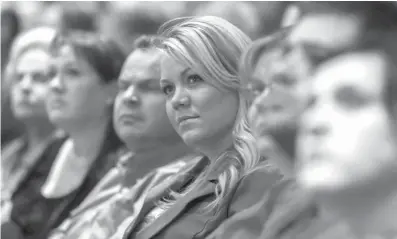  ?? The Salt Lake Tribune file photo via AP ?? Elissa Wall attends a community meeting regarding the United Effort Plan trust on Nov. 30, 2012, in Colorado City, Ariz. Wall, who was married to her cousin at age 14 in a ceremony overseen by polygamous sect leader Warren Jeffs, has won a $16 million...