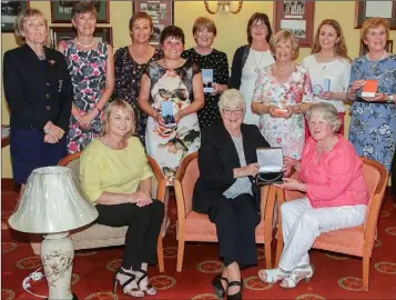 ??  ?? Lady President’s prize in Rosslare. Back (from left): Doreen McGovern (lady Captain), Catherine Haugh, Paula Stafford, Bríd Ní Bhríain, Norrie Goff, Carol O’Brien, Molly Cash, Alannah Duggan, Sheila Crosbie. Front (from left): Mairéad Esmonde (second),...