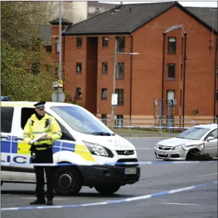  ?? Picture: Jamie Simpson ?? A police cordon around a crashed car on Atlas Road in Springburn