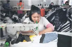  ??  ?? Chinese factory activity stabilised in October, according to independen­t data, one day after a disappoint­ing official reading suggested output growth had slowed. — AFP photo