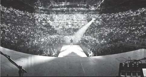  ??  ?? Swift shared this photo on Instagram that her guitarist took during a recent show at an arena in London. — Instagram photo