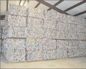  ??  ?? Bales of aluminum cans are stacked to the ceiling in a storage building at the Bella Vista Recycling Center.
(NWA Democrat-Gazette/Rachel Dickerson)