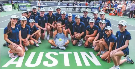  ?? ATX OPEN / WTA ?? China’s Yuan Yue poses with the trophy alongside the ballboys and ballgirls of the ATX Open after outlasting fellow Chinese Wang Xiyu 6-4, 7-6 (4) to win her first WTA title on Sunday.