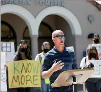  ?? PHOTOS BY RAY CHAVEZ — STAFF PHOTOGRAPH­ER ?? San Jose State coach Sage Hopkins speaks at a rally organized by Students Against Sexual Assault on May 11.