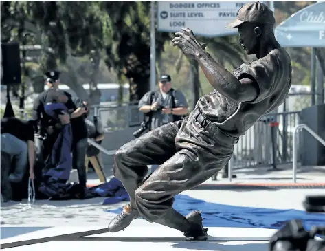  ?? VICTOR DECOLONGON/GETTY IMAGES ?? A general view of the Jackie Robinson statue is seen shortly after its unveiling at Dodger Stadium on April 15, in Los Angeles.