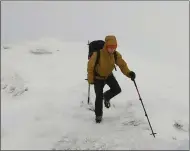  ??  ?? On a snowy Stob Binnein, in the Crianlaric­h hills...