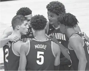  ?? MADDIE MEYER/ GETTY IMAGES ?? Villanova features, among others, Jeremiah Robinson- Earl, second from right, Collin Gillespie and Justin Moore.