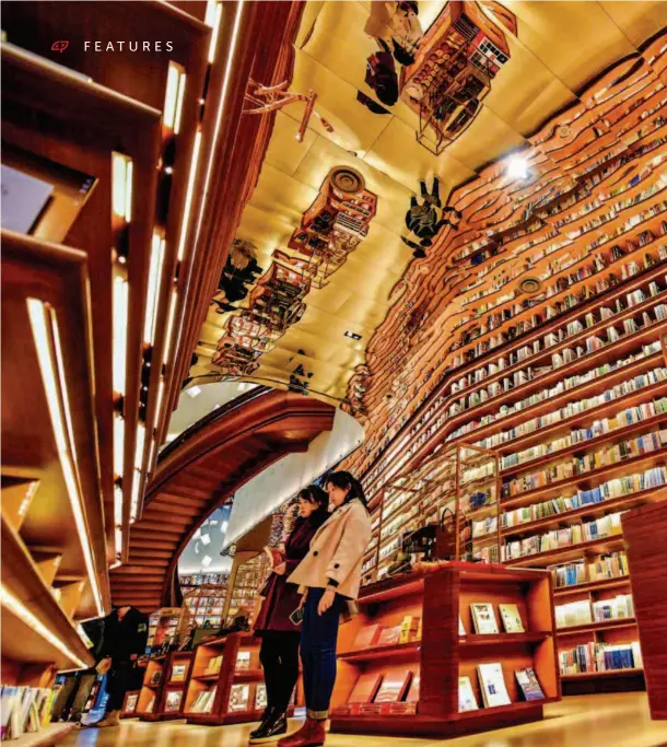  ??  ?? The business patterns of China’s book industry have been constantly enriched, and many “most beautiful bookstores” have been crowned. The picture shows the Yanjiyou bookstore in Xi’an, Shaanxi Province, on December 19, 2018. VCG