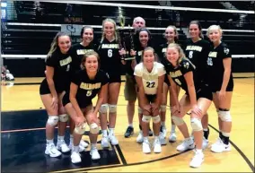  ?? CONTRIBUTE­D PHOTO ?? The Calhoun volleyball team poses for a picture with their first-place trophy from the At The Rock Tournament on Saturday at Rockmart High. The Lady Jackets went 6-0 on the day to improve to 10-0 for the season.