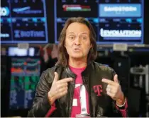  ?? — Reuters ?? T-mobile CEO John Legere speaks about his company’s merger with Sprint during an interview on CNBC on the floor of the New York Stock Exchange (NYSE) in New York City, US.