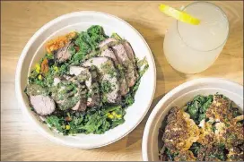  ?? CONTRIBUTE­D BY MIA YAKEL ?? The Roast offers signature bowls, including the Chimichurr­i Beef bowl and Crispy Cauliflowe­r, and draft cocktails like Peachy Duck Buck Mule.