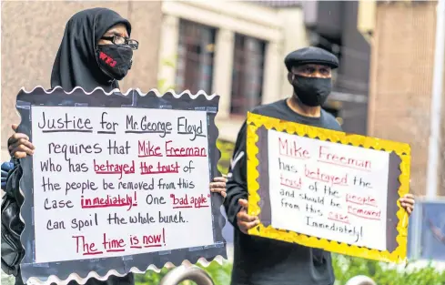  ?? AFP ?? Protesters gather outside the Public Safety Facility building on Monday in Minneapoli­s, Minnesota before former police officer Derek Chauvin was charged in the death of George Floyd.