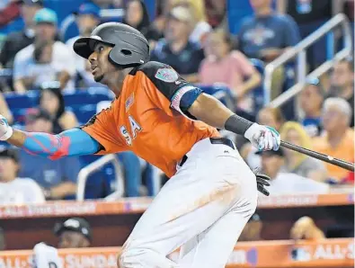  ?? JIM RASSOL/STAFF FILE PHOTO ?? Lewis Brinson, ranked as baseball’s No. 18 prospect and the Marlins’ No. 1 prospect by Baseball America, lit up Triple-A pitching in the Pacific Coast League in 2017: .331/.400/.562, 13 home runs, 48 RBI, 11 steals.