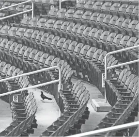  ?? ROB SCHUMACHER/THE ARIZONA REPUBLIC ?? Salt River Fields in Scottsdale, Arizona, has been empty of fans since March 12, when spring training games were canceled.