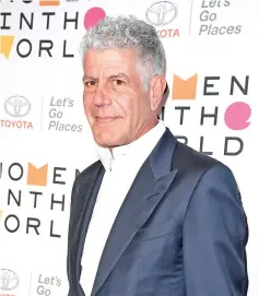  ??  ?? Bourdain -- who committed suicide in June at age 61 -- personally earned statuettes for best writing for a nonfiction program and outstandin­g informatio­nal series for “Anthony Bourdain: Parts Unknown.”