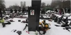  ?? ANDREY SMIRNOV/AFP/GETTY IMAGES FILE PHOTO ?? The grave of Russian lawyer Sergei Magnitsky at the Preobrazhe­nskoye cemetery in Moscow. Russia denies any involvemen­t in his death.