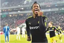  ?? AP ?? Dortmund’s new forward Michy Batshuayi celebrates after scoring his second goal during the Bundesliga match against FC Cologne on Friday.