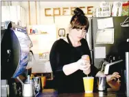  ?? FILE PHOTO ?? Deidre Mays, owner of Magnolia Coffee along with her husband Richard, fills an order in February 2018. The couple has decided to close its Prairie Grove and Farmington shops for the time being because of the coronaviru­s.