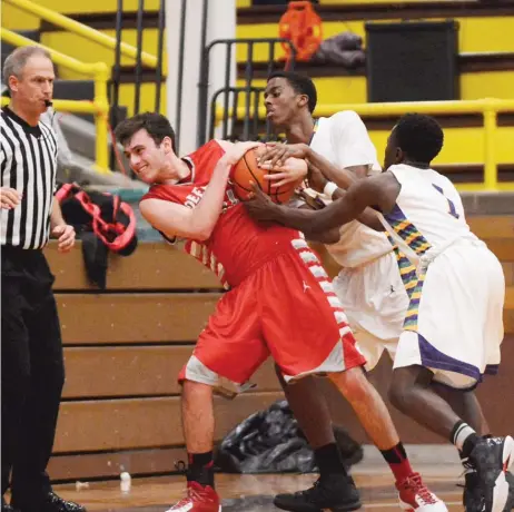  ?? | FOR THE SUN- TIMES ?? Deerfield coach Dan McKendrick says star point guard Jordan Baum ( shown againstWau­kegan) ‘‘ gives everyone confidence.’’