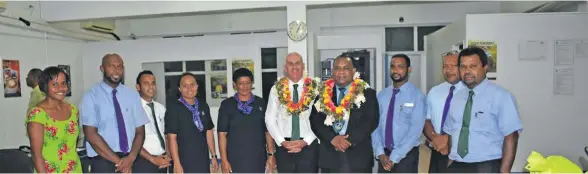  ??  ?? Fiji Developmen­t Bank chief executive officer Mark Clough (sixth from left), and chief guest, Commission­er Northern Jovesa Vocea (seventh from left) with staff members and officials during the opening of the FDB Taveuni office.