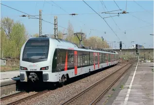  ?? KEITH FENDER ?? The Abellio brand will soon be rarer in the Ruhr. Abellio-liveried dual voltage Flirt EMU No. ET 25 2302 departs Wesel with a cross border service for Arnhem on April 10, 2019. These services have been taken over by VIAS.