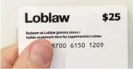 ?? RICHARD BUCHAN / THE CANADIAN PRESS ?? Loblaws is requiring some customers to provide a driver’s licence or utility bill to obtain their gift card.