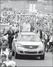  ?? AP/FERNANDO VERGARA ?? Pope Francis arrives Saturday to celebrate an outdoor Mass in Medellin, Colombia.