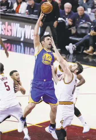  ?? Carlos Avila Gonzalez / The Chronicle ?? Zaza Pachulia. playing in his first NBA Finals, has helped the Warriors build a 3-0 series lead.