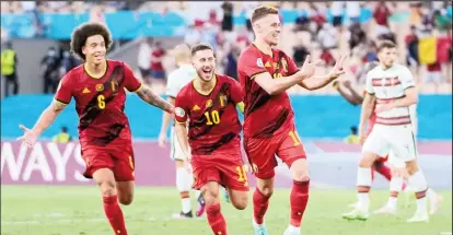  ??  ?? Belgium’s Thorgan Hazard celebrates scoring their first goal Pool via REUTERS/Thanassis Stavrakis