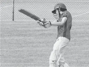  ??  ?? Warragul/Western Psark’s Patrick Mulqueen hit out for a gutsy 35 not out during the under 14 match against Drouin Gold