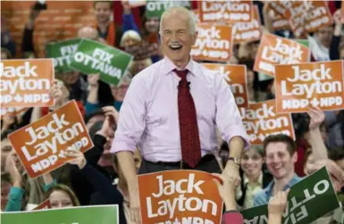  ?? PAUL CHIASSON/THE CANADIAN PRESS FILE PHOTO ?? New Democrat leadership candidates talk a lot about Jack Layton and the gains the party made during his leadership.