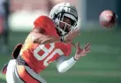  ?? BRYAN TERRY/THE OKLAHOMAN ?? OSU receiver Brennan Presley catches a pass during practice on Aug. 12 in Stillwater.