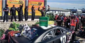  ?? DAVE KALLMANN / JOURNAL SENTINEL ?? Ty Gibbs and his Joe Gibbs Racing crew celebrate their victory in the Sprecher 150 on Sunday at the Milwaukee Mile.