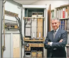  ?? LEONARD KLEINROCK/AFP ?? Leonard Kleinrock poses with the first Interface Message Processor. Kleinrock never imagined Facebook, Twitter, or YouTube when his team gave birth to what is now the internet.